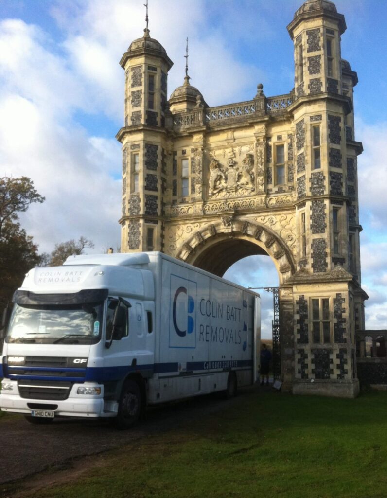 Colin Batt Removals & Storage lorry parked in front of Eastwell Towers in Ashford, Kent, providing local moving services.